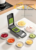 16 - in - 1 Vegetable Chopper with 8 Blades – Onion, Potato, Carrot Slicer, Includes Strainer Basket & Containe - KitchenKlout
